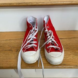 Converse high top platform shoes .